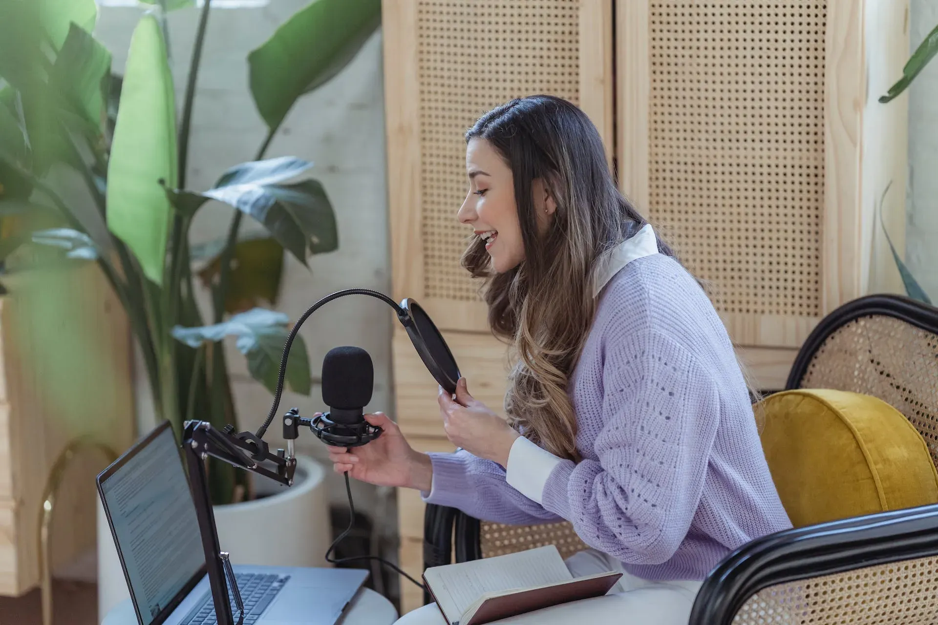 Speaking into a microphone 