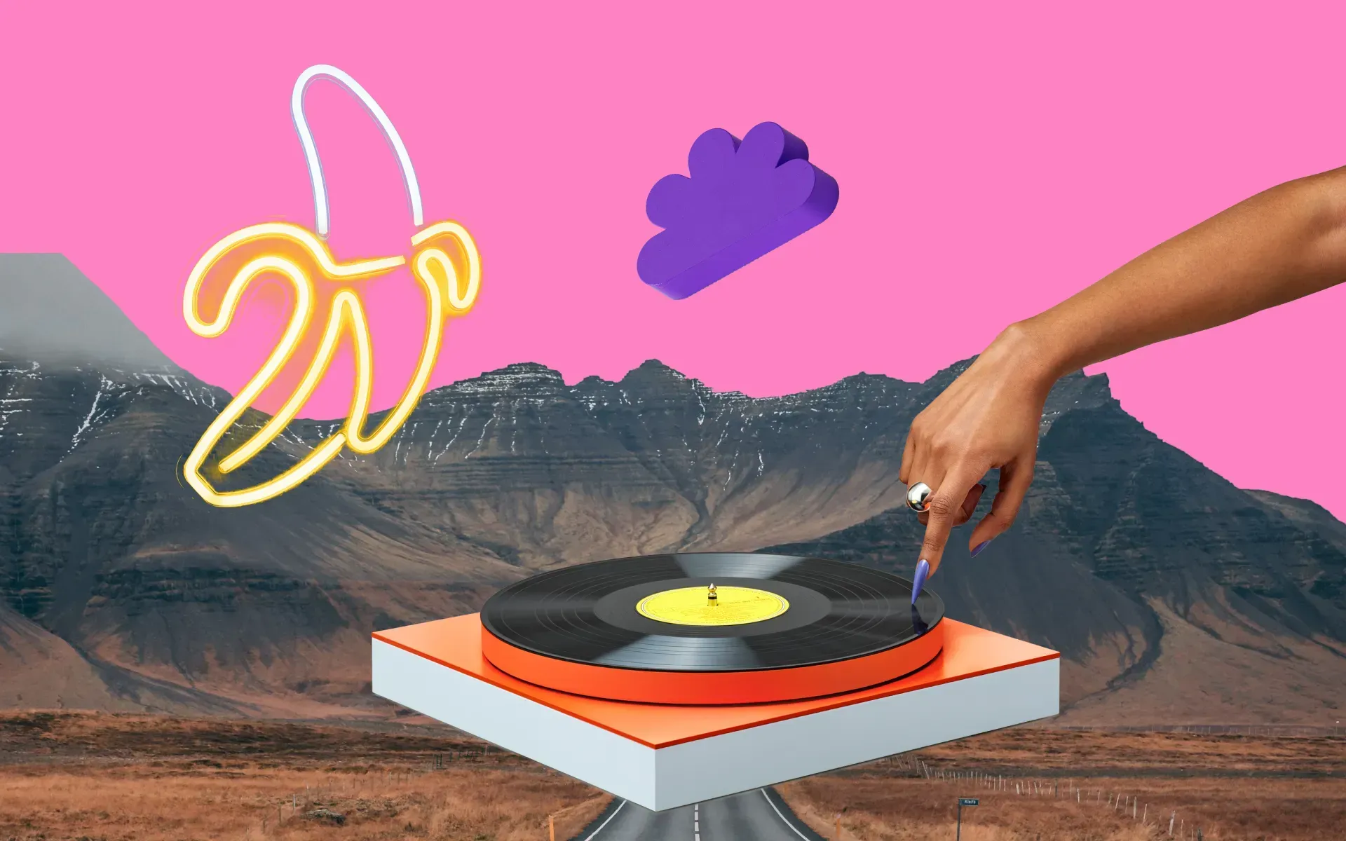A finger pressing down on a vinyl record with an abstract, mountain-range background