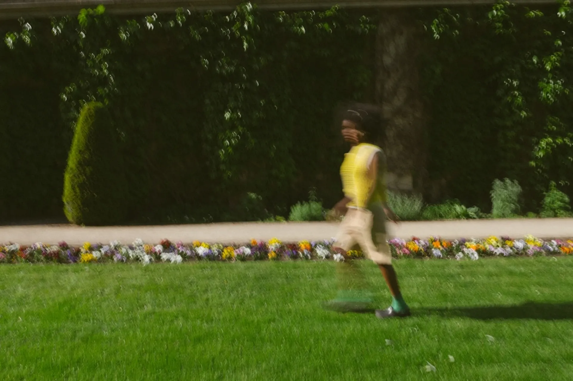 Woman walking in a garden