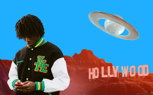 A man texting in front of a Hollywood sign, with a planet floating in the sky